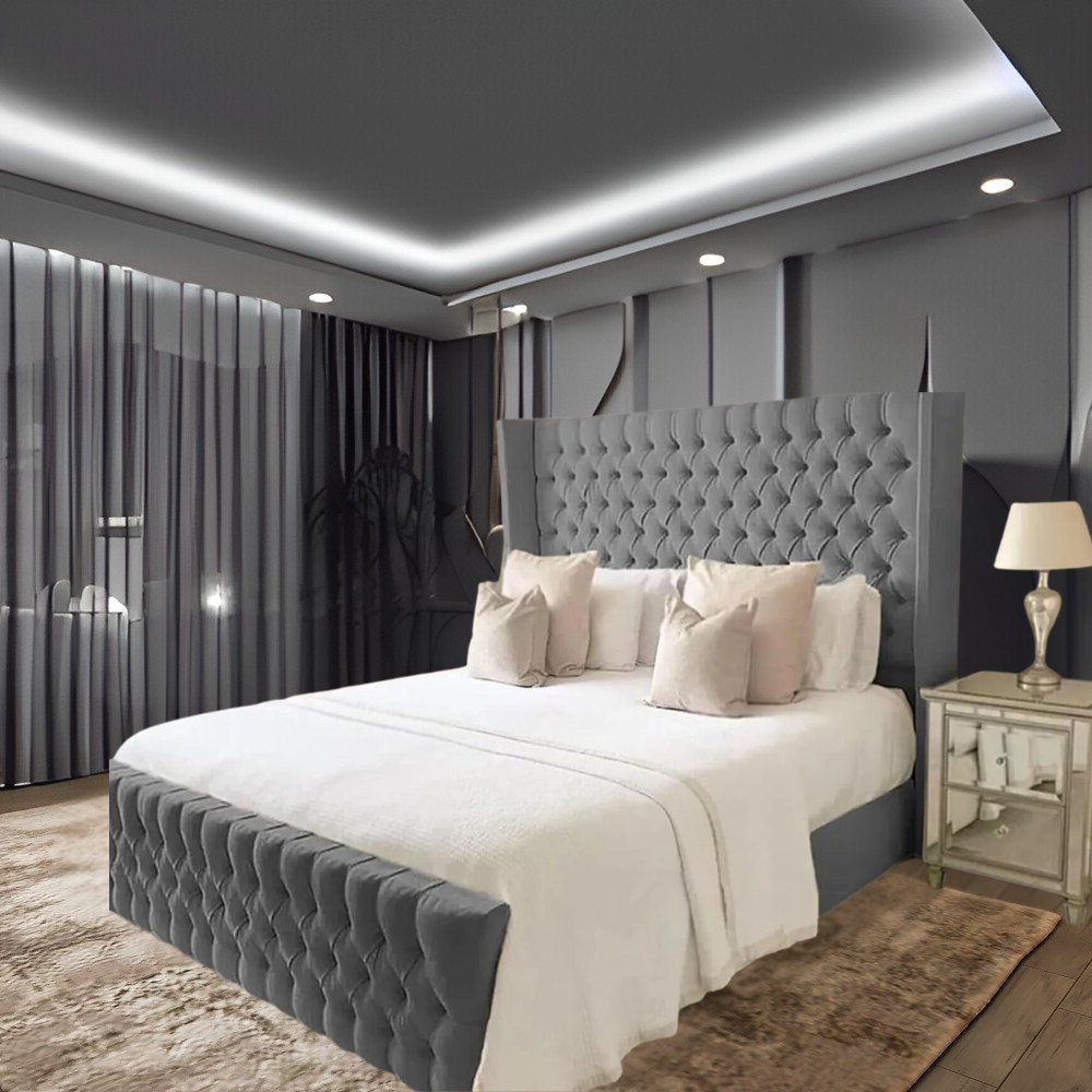 Modern acewingback bed with a gray tufted headboard and white bedding.
