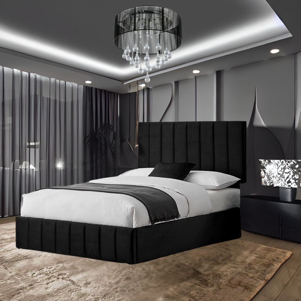 Modern bedroom with a large black and white FinnPanel bed, a chandelier, and decorative walls.