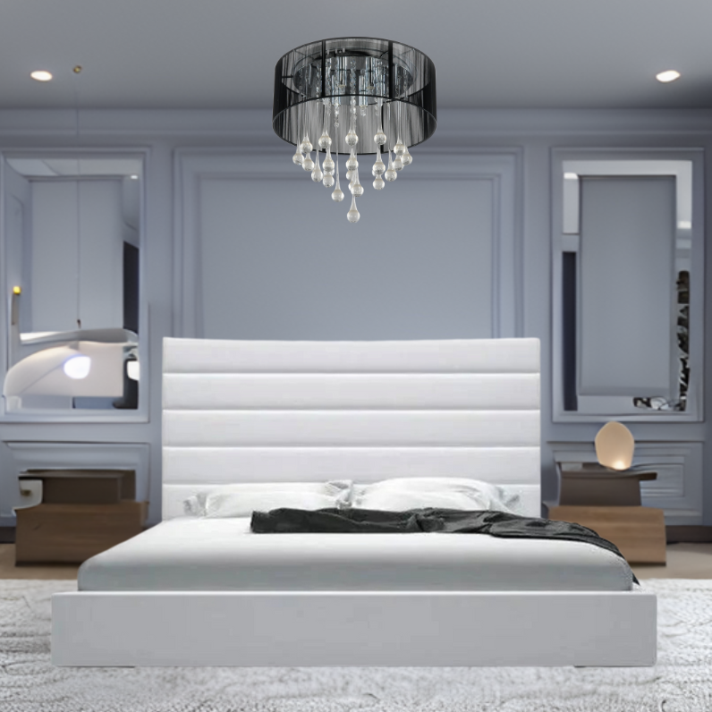 Modern gray bedroom with a large white Leo Panel bed, chandelier, and wooden nightstands.