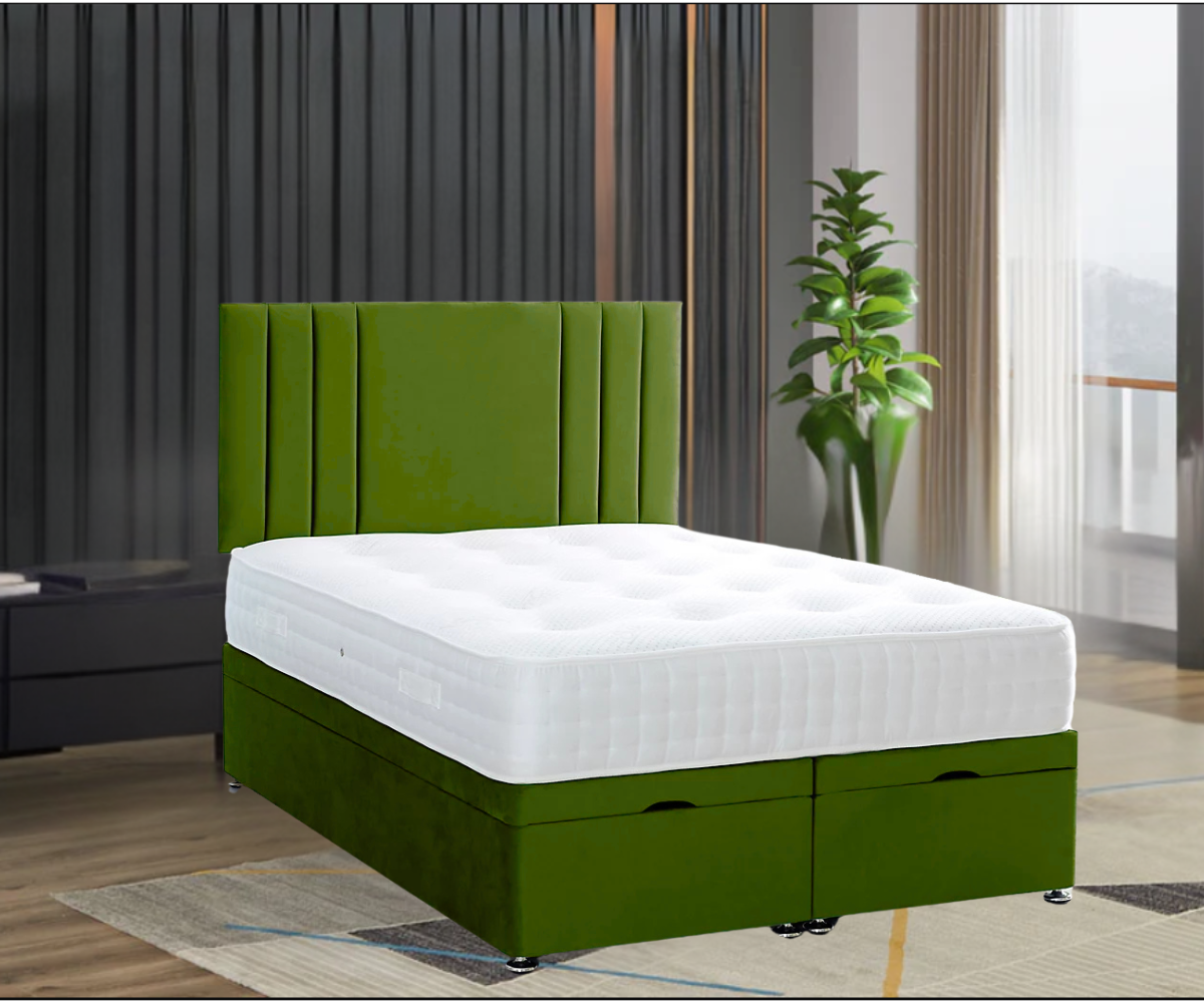 A RowanPanelBed with a green upholstered headboard and base, featuring a white tufted mattress, in a modern bedroom with a large potted plant and geometric rug.