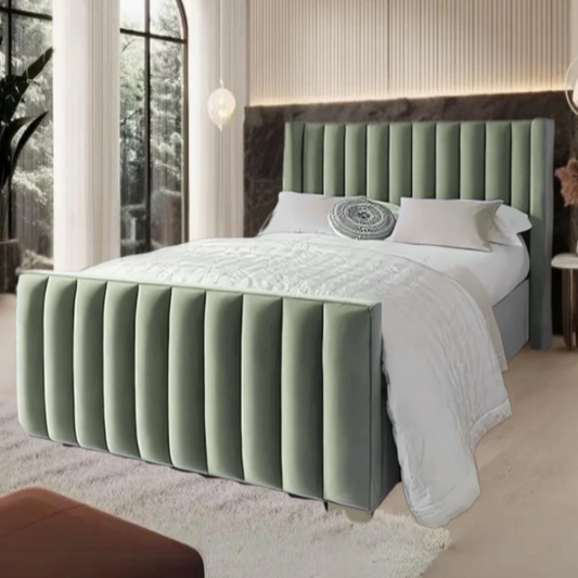 Modern bedroom with a padded green Erik Panel Bed, large windows, and rust-colored décor.