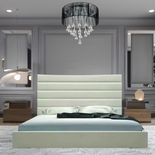 Modern bedroom with a central Leo Panel bed, chandelier, and decorative mirrors.