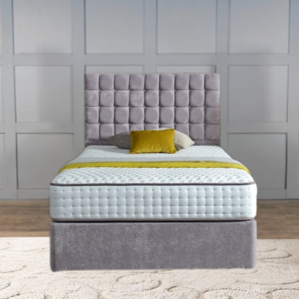 A MarioCubeBed with a gray tufted headboard and mustard accents against a paneled wall.

