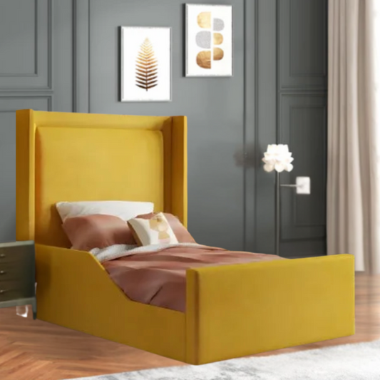 Modern bedroom with a yellow Zayn Wingback Bed, nightstand, and framed wall art.